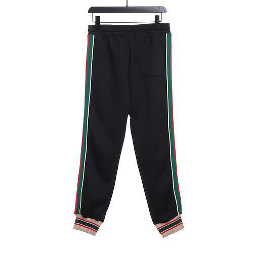 GUCCI Pantaloni classici Gucci con motivo web jacquard rosso e verde scuro