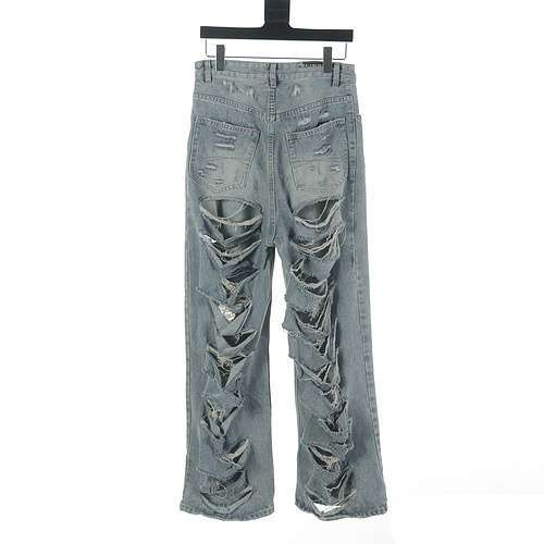 Pantaloni Balenciaga BLCG 24SS in denim wideleg strappati con fori