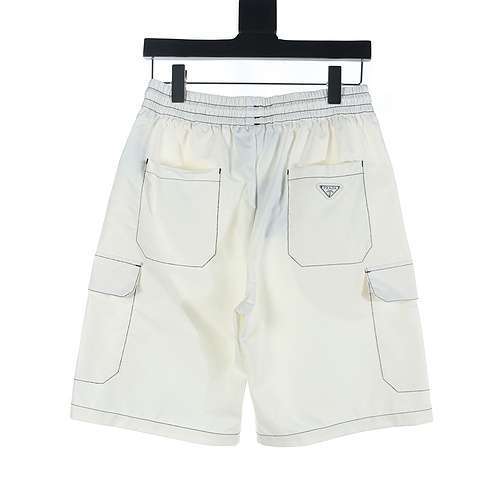 Shorts Prada PRD in nylon con logo triangolare impunturato a contrasto