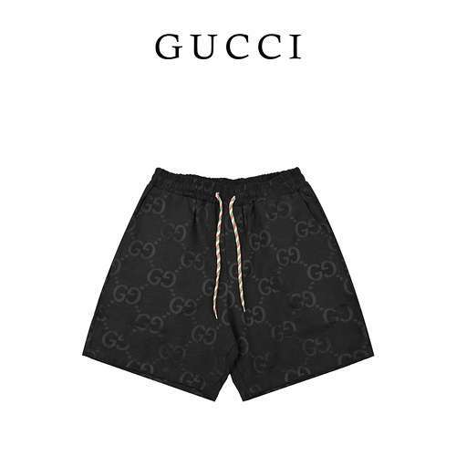 Shorts GC Gucci jacquard con micro etichetta doppia G stampata all over e coulisse