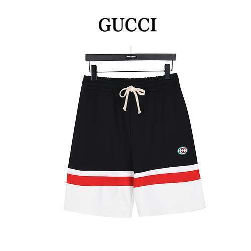 Shorts con doppia G ricamata patchwork a righe Gucci