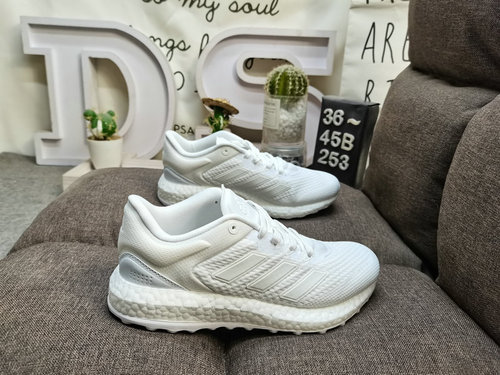 The 253D Adidas Pureboost Select GW3500 popcorn cushioned midsole running shoe upper is made of wove
